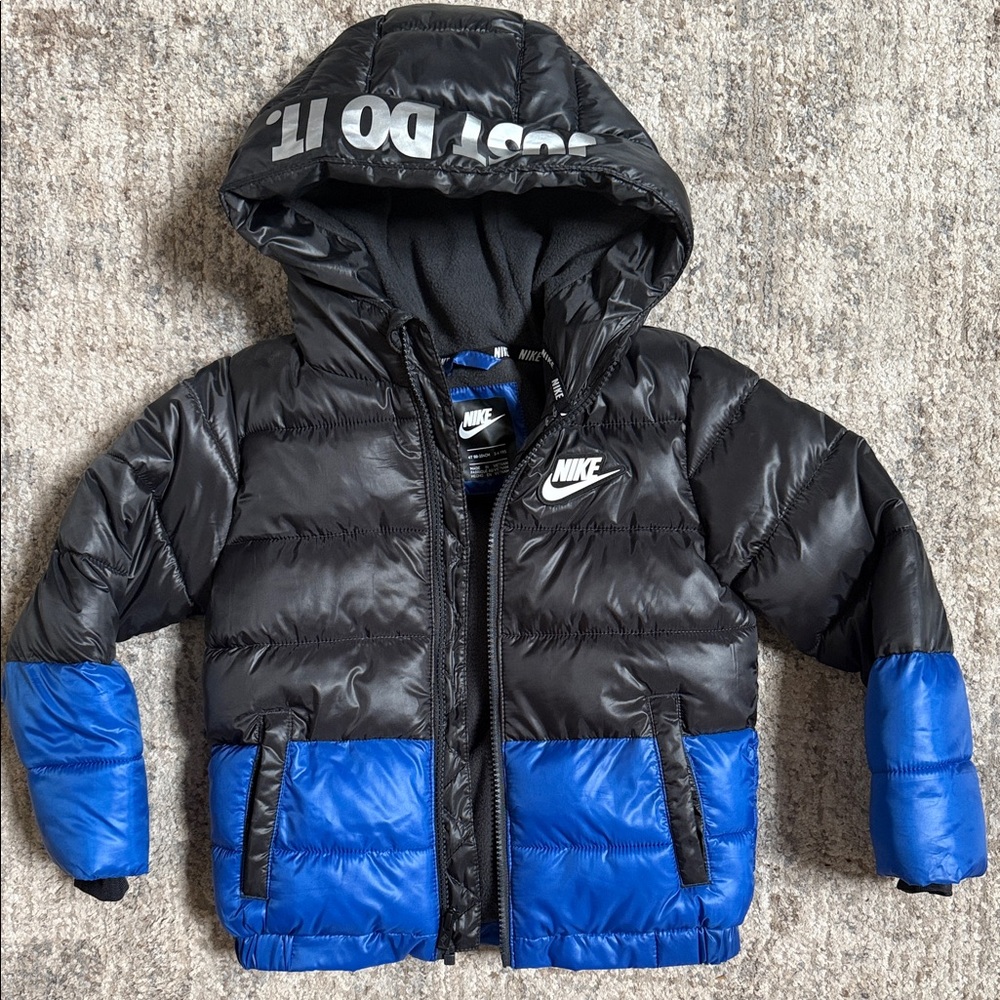 Nike Black & Blue Hooded Puffer Jacket. New without tags